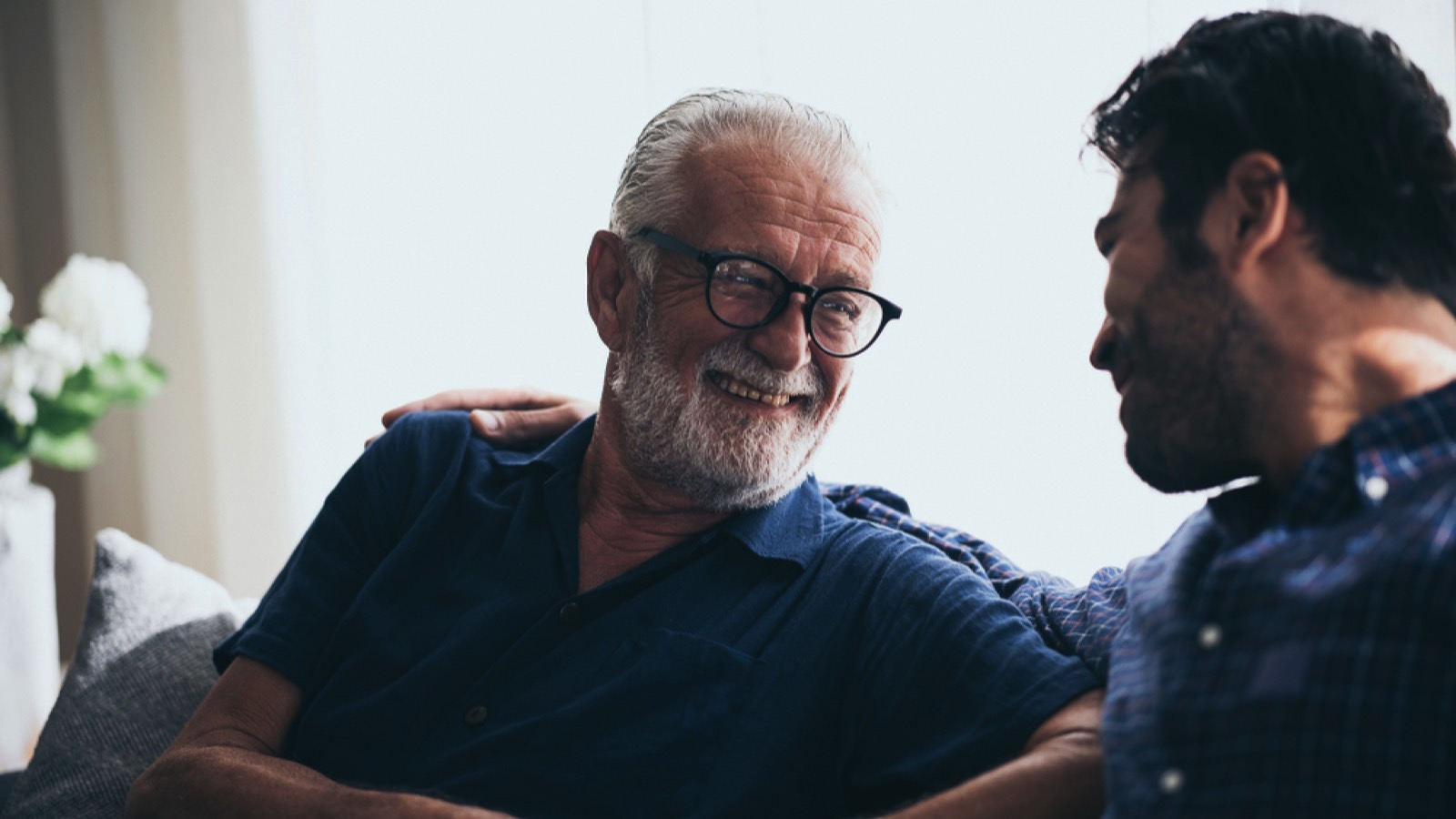 Man talking to grandfather