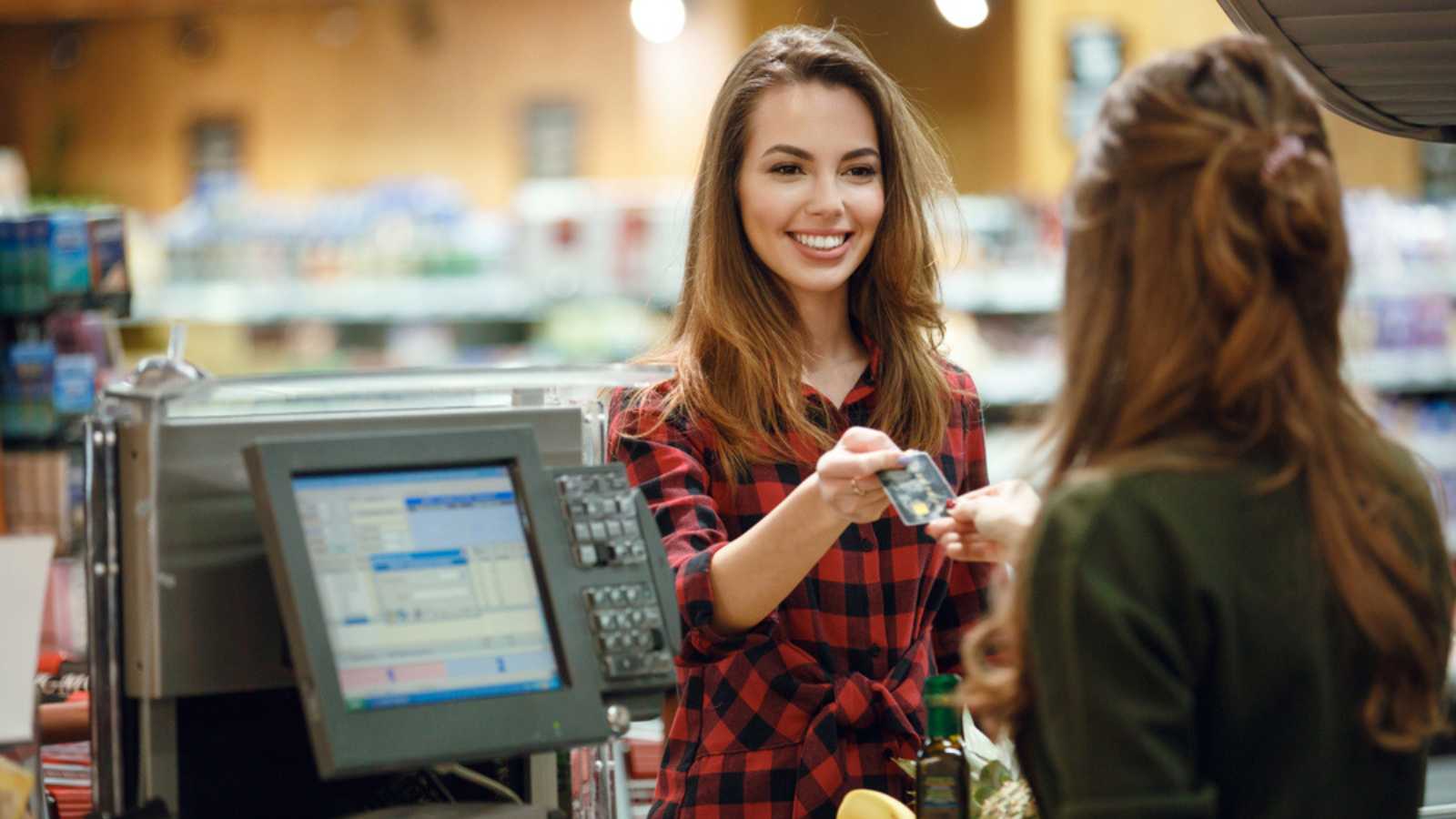 Woman paying in cash